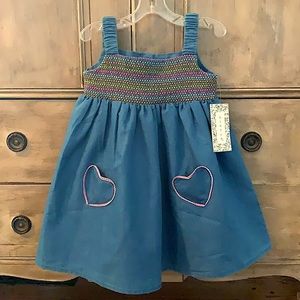 Between denim dress with heart pockets